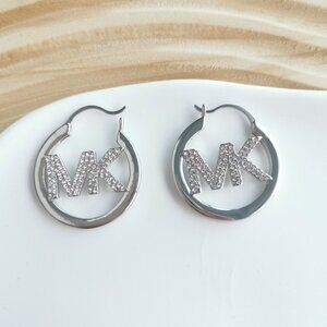 Michael Kors Pave Hollow Logo Hoop Earrings. Silver Plated